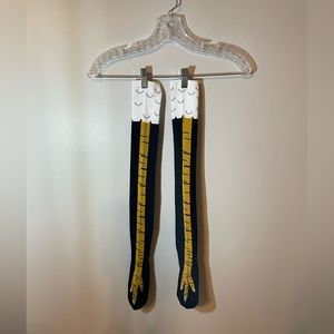 NEVER WORN. Women’s tall, ostrich socks.